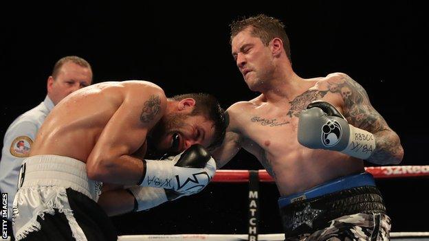 Ricky Burns in action against Kiryl Relikh