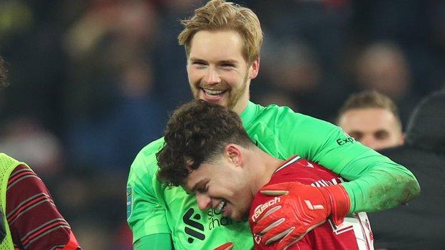 Caoimhin Kelleher celebrates the quarter-final success with Liverpool team-mate Neco Williams