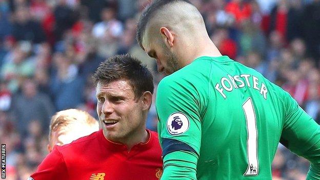 Liverpool's James Milner (left) and Fraser Forster