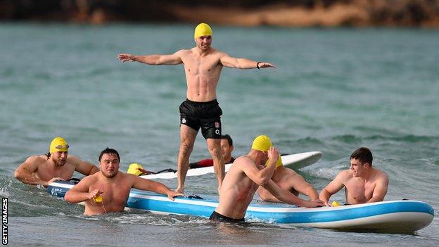 England players paddleboard