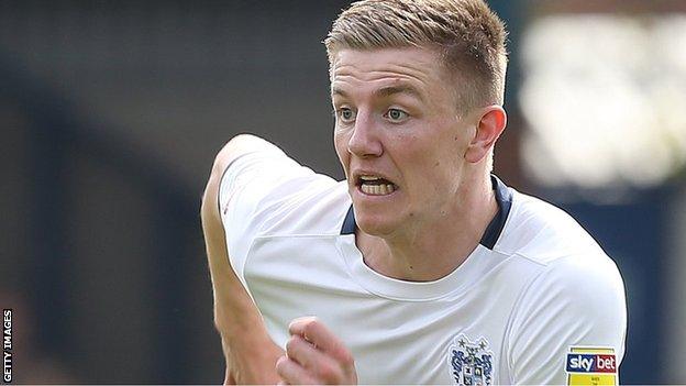 Scott Wharton in action for Bury