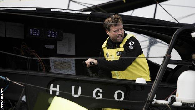 Alex Thomson on board Hugo Boss at the start of the Route du Rhum