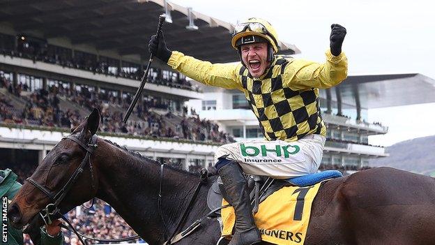 Paul Townend celebrates winning the Gold Cup on Al Boum Photo