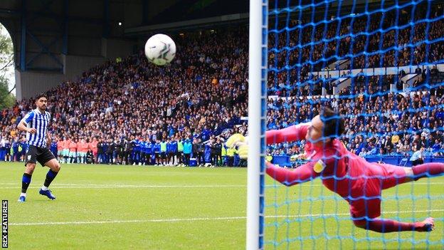 Lee Nicholls saves from Massimo Luongo