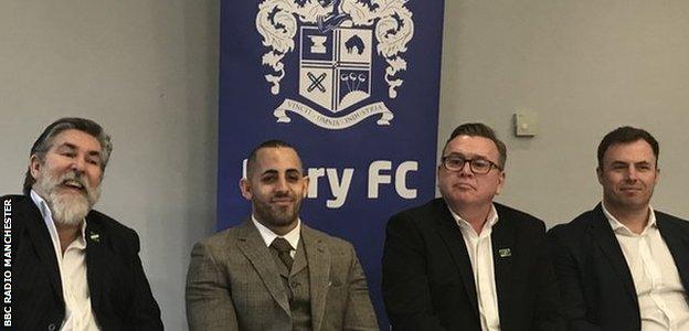 Steve Dale (left) was presented to the media in December following his takeover of Bury Football Club