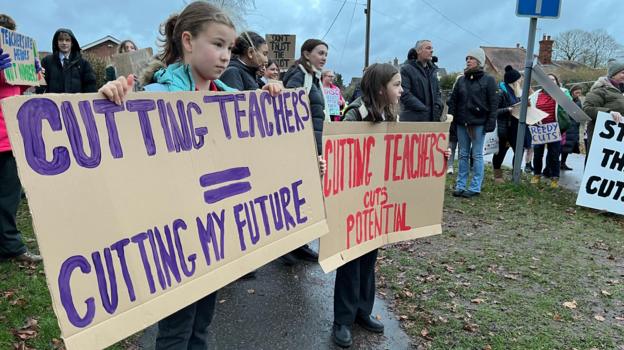 Parents join protest at Reepham High School over proposed cuts - BBC News