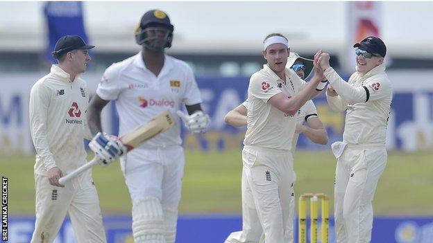 Stuart Broad celebrates wicket of Angelo Matthews