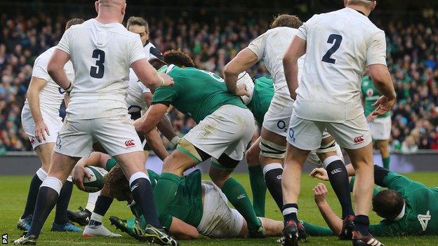 Iain Henderson reaches forward to score the only try of the game