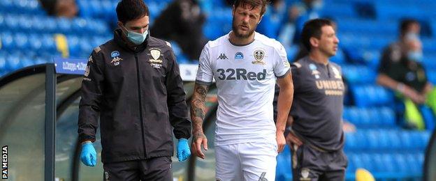 Liam Cooper hobbles off