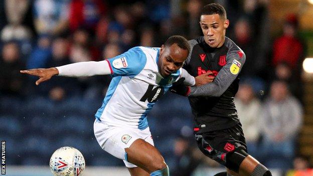 Blackburn full-back Ryan Nyambe (left)