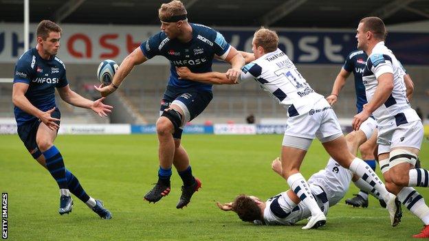 Daniel du Preez tees up team-mate Luke James for Sale's opening try against Bristol