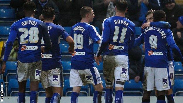 Chesterfield players celebrate another goal against Shrewsbury