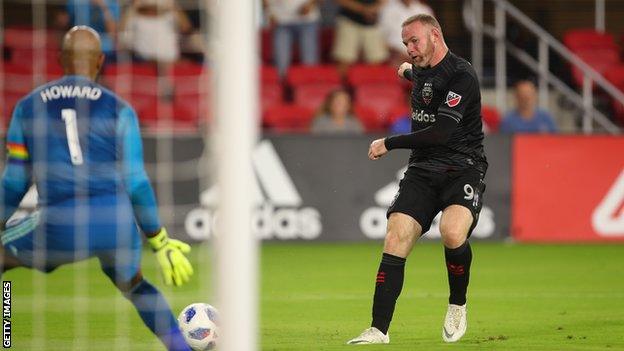 DC United forward Wayne Rooney scores against Colorado Rapids for his first MLS goal