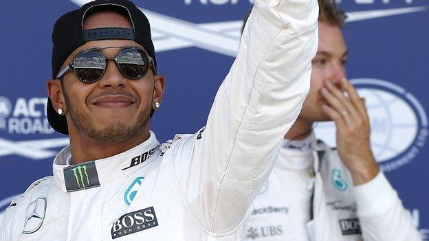 Lewis Hamilton celebrates taking poll for the British Grand Prix