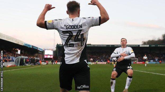 Coventry striker Matt Godden celebrated the second of his three goals against Wycombe at Adams Park with Jordan Shipley