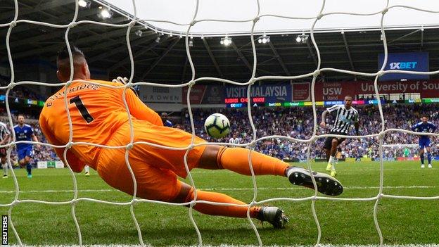 Picture of Cardiff keeper Neil Etheridge saving Newcastle midfielder Kenedy's stoppage-time penalty