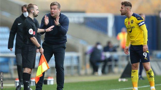 Oxford United manager Karl Robinson will watch his side from the stands this weekend after being handed a one game touchline ban