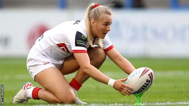 Tara-Jane Stanley lines up a kick at goal