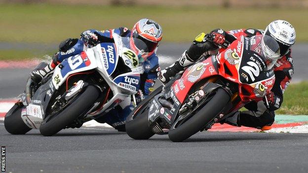 Glenn Irwin leads Christian Iddon during one of the Superbike races at Bishopscourt