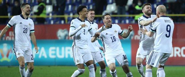 NI celebrate their penalty success