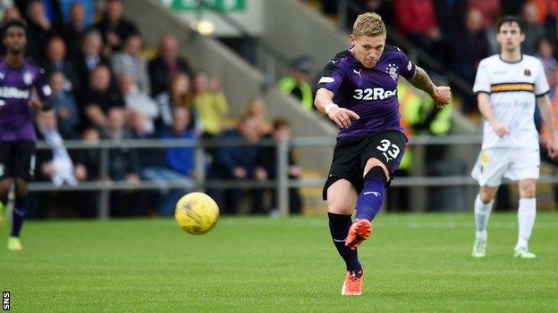 Rangers forward Martyn Waghorn scores against Dumbarton