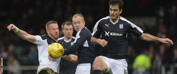 Dundee struggled to contain Aberdeen at a blustery Dens Park