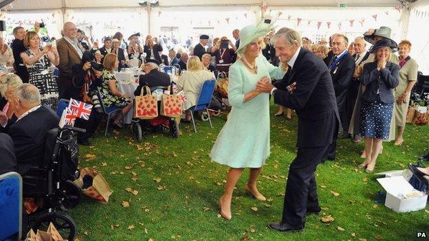 The Duchess of Cornwall dancing with Royal Navy veteran Jim Booth, 94