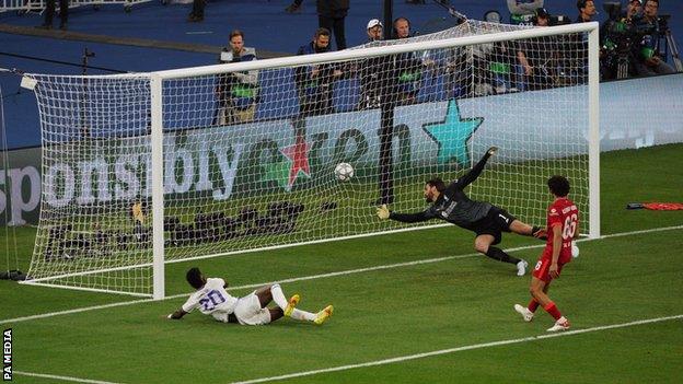 Vinicius Jr scores for Real Madrid against Liverpool in the 2022 Champions League final