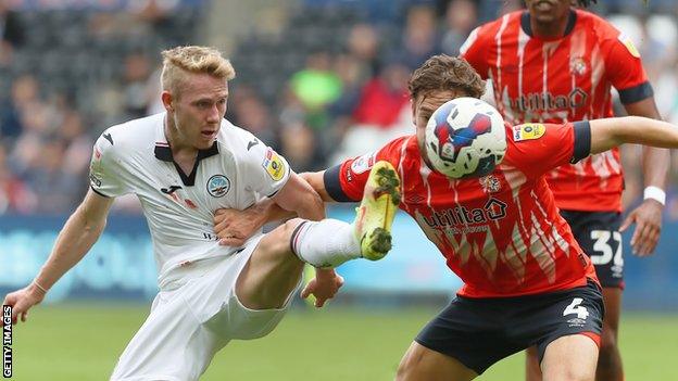 Ollie Cooper in action against Luton