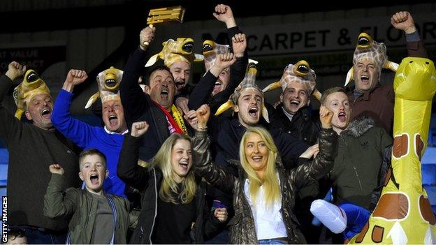 Sutton United fans enjoy the pre-match atmosphere