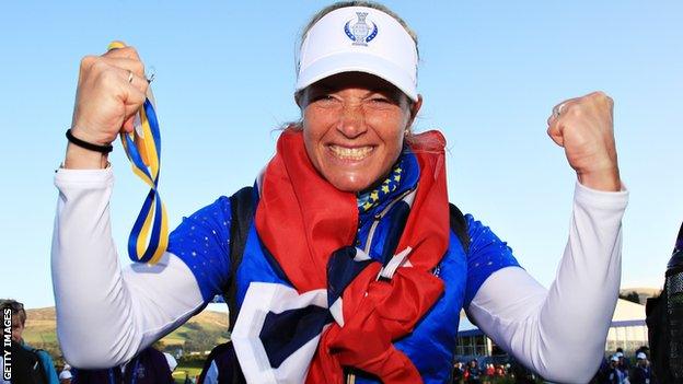 Suzann Pettersen's face says it all - this is how it feels to roll in the winning putt at the Solheim Cup