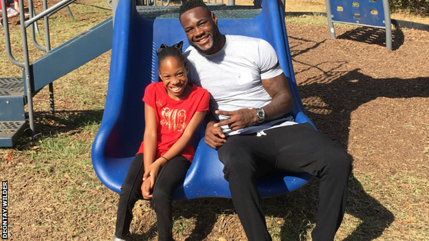 Deontay Wilder with his daughter Naieya