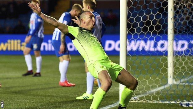 Scott Brown celebrates his winner with Celtic fans