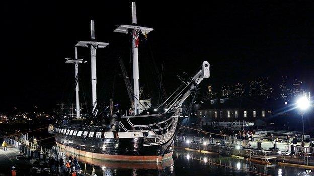 The USS Constitution is guided into a dry dock in Boston on 18 May 2015