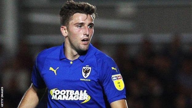 Ben Purrington in action for AFC Wimbledon