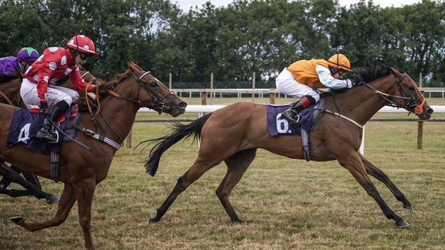 Sophie Ralston riding a winner at Bath