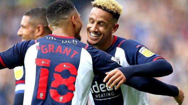 Karlan Grant's socially distanced celebration with Callum Robinson, who scored for the second week running