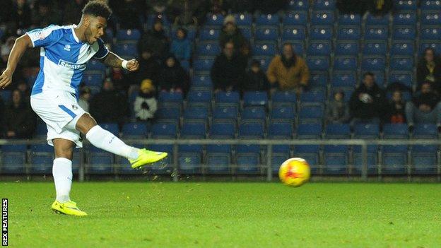 Ellis Harrison scores a penalty for Bristol Rovers to win at Oxford United