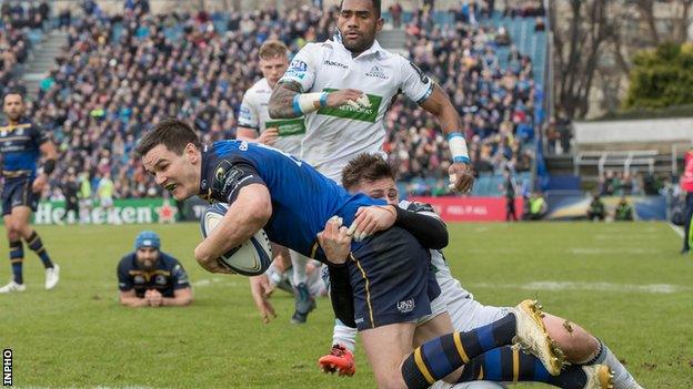 Leinster fly-half Johnny Sexton crosses for his side's fifth try against Glasgow