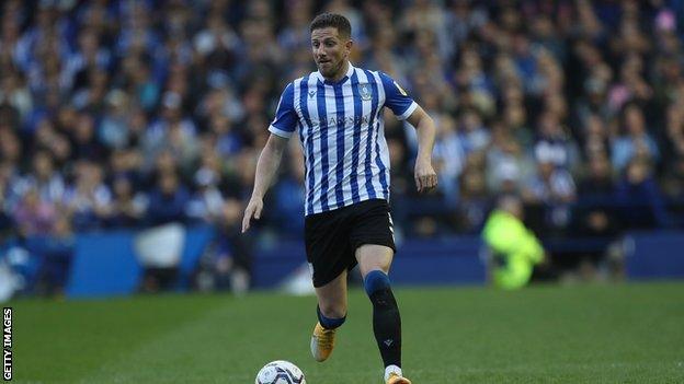 Sam Hutchinson playing for Sheffield Wednesday