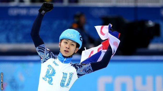 Viktor Ahn celebrates winning gold in the short track men's 500m at Sochi 2014