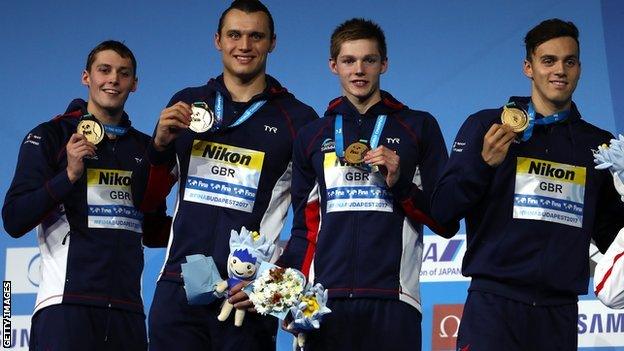 Scottish swimmers Duncan Scott (left) and Stephen Milne (right) with their relay medals