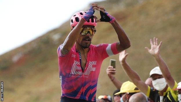 Daniel Martinez holds his hands up in celebration after winning stage 13 of the 2020 Tour de France