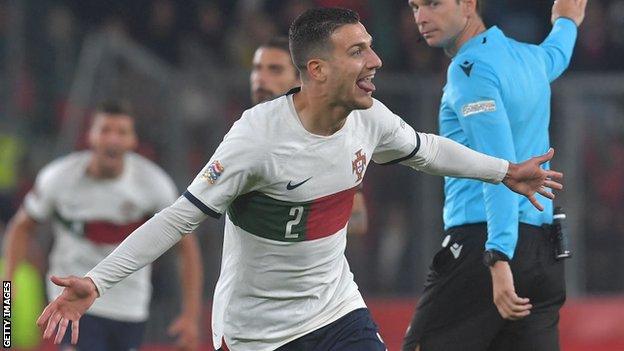 Diogo Dalot celebrates scoring for Portugal