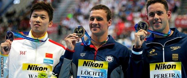 Gold medallist Ryan Lochte (C) of the United States poses with silver medalist Thiago Pereira (R) of Brazil and bronze medalist Shun Wang (L) of China