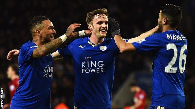 Andy King (centre) celebrates a goal with Danny Simpson and Riyad Mahrez