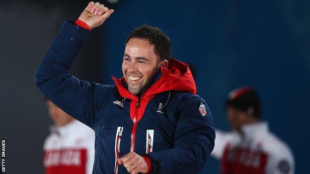 David Murdoch enjoys the medal ceremony at the Sochi Games in 2014