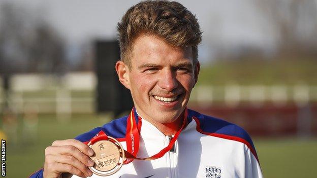 Andrew Butchart with a bronze medal from the 2017 European Cross Country Championships