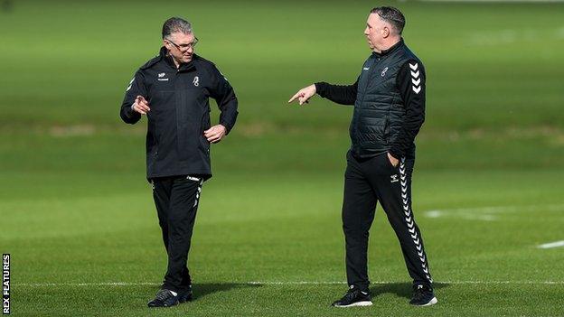 Tinnion (right) with Bristol City manager Nigel Pearson