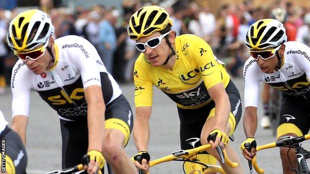 Chris Froome (left) and Egan Bernal (right) with Geraint Thomas at the 2018 Tour de France